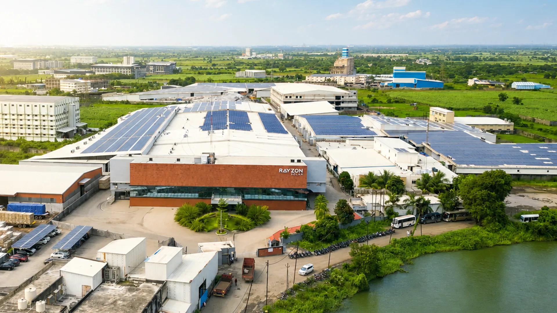 Aerial view of rooftop solar panels at Drishya Polyfills Pvt. Ltd industrial building.